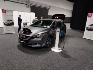 A Nissan Leaf displayed at an Expo